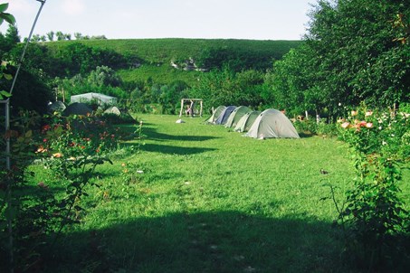 The campsite with tents.