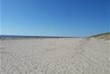 Kilometerlanger Sandstrand am Strand vom Rondeweibos