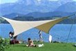 Seecamping Vierwaldstättersee - Badestelle mit Blick auf Halbinsel Hertenstein und Zentralschweizer Alpen