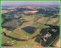 Aerial shot of the park showing the golf course and fishing lakes.